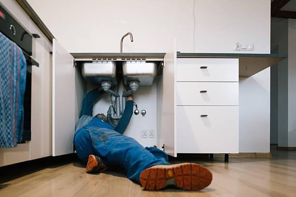Professional Drain Cleaning technician working in Wixom, MI